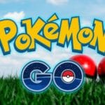 pokemon go logo with pokeballs in background