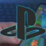 black playstation logo with blurred background depicting a smartphone